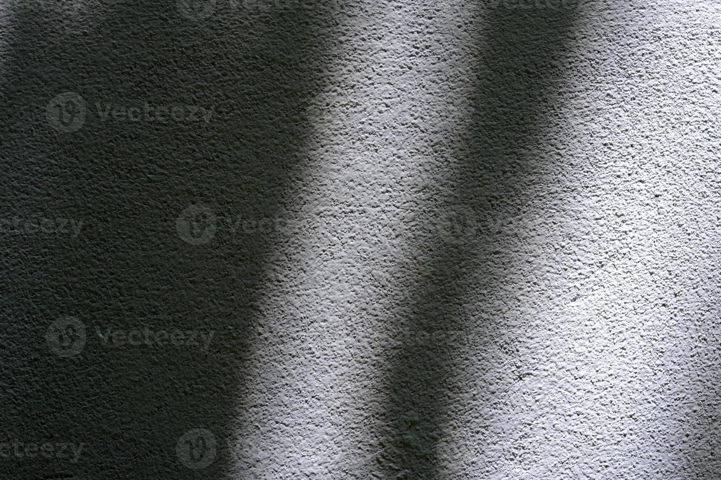 Light Beam and Shadow on Concrete Wall. photo