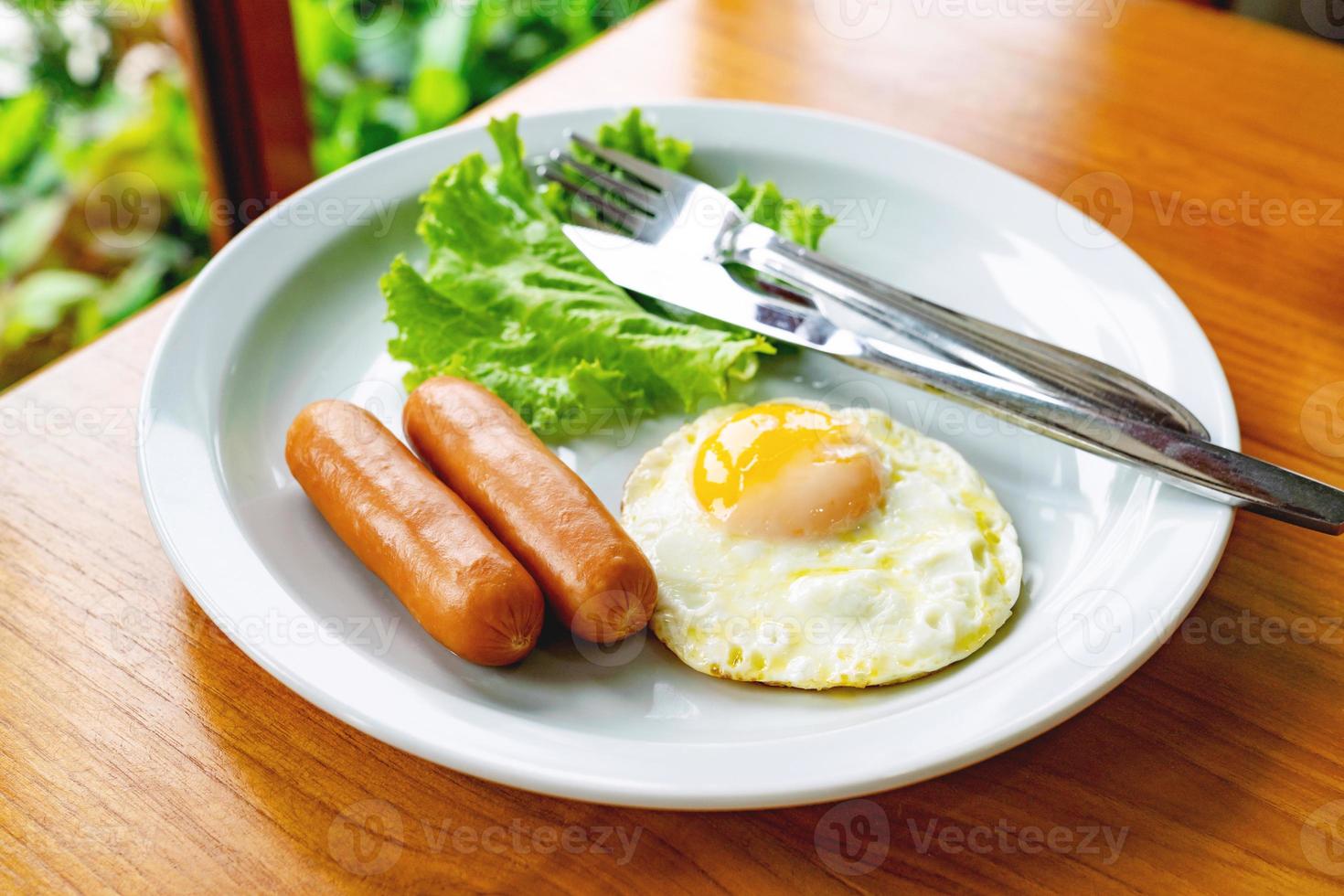 set breakfast with  sausages fried egg photo
