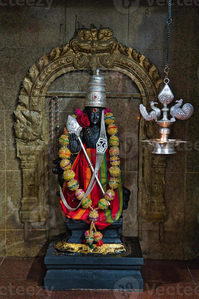 Hindu god in the Hindu temple in town Victoria on Mahe photo