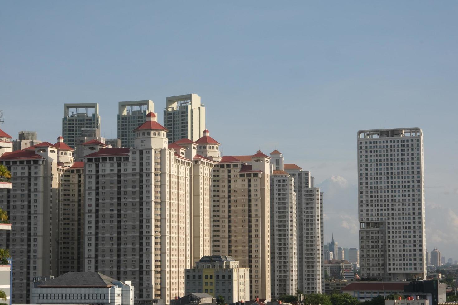 evening atmosphere in the city of Jakarta with tall buildings photo