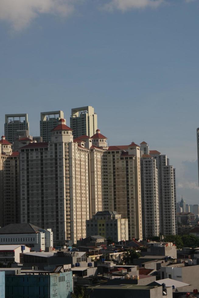 buildings in the city of jakarta at noon photo