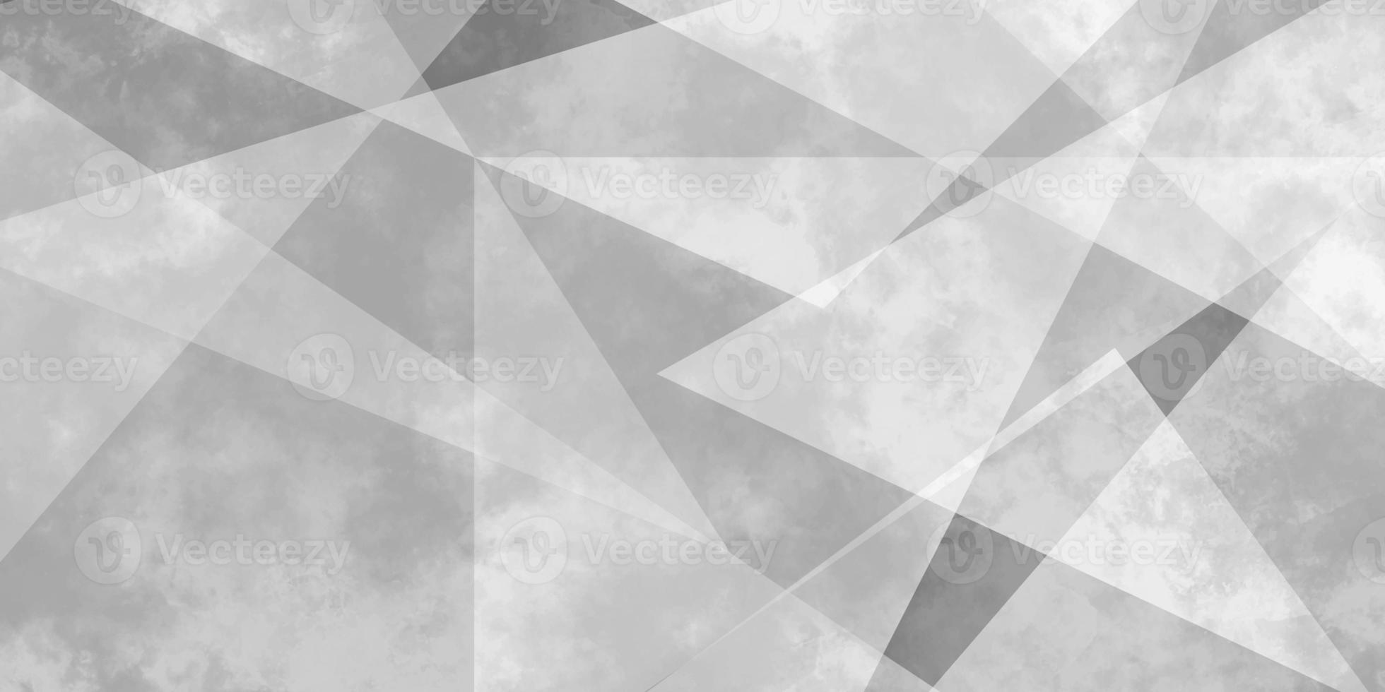 abstract geometric background with triangles. white and grey background. space design concept. textured white material in triangle shapes in random decorative web layout or poster, banner. photo