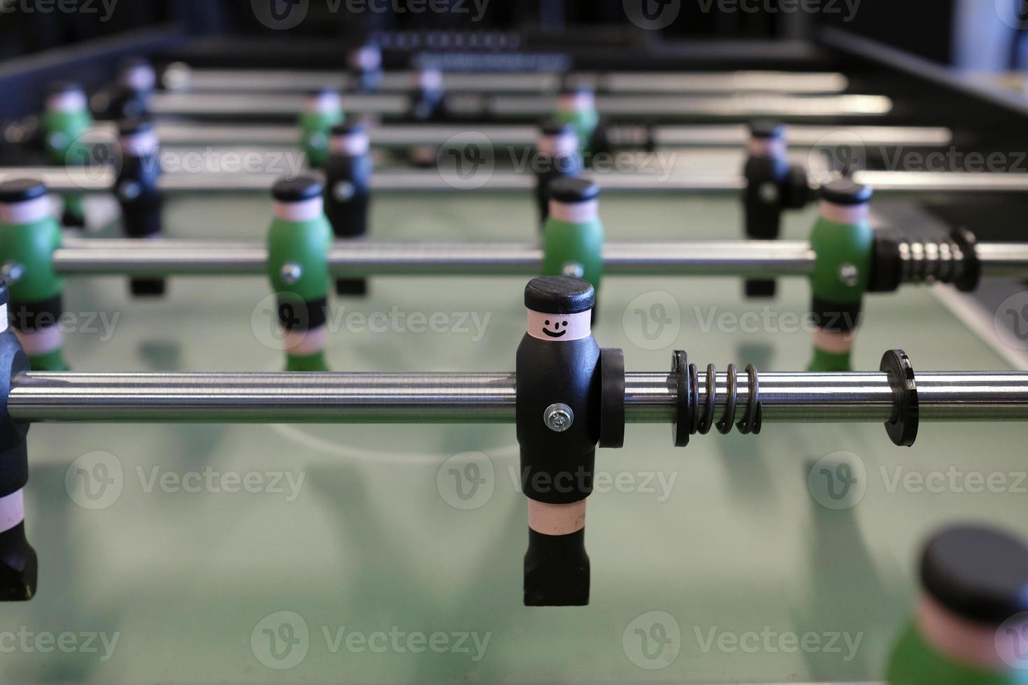 Selective focus on foosball table player photo