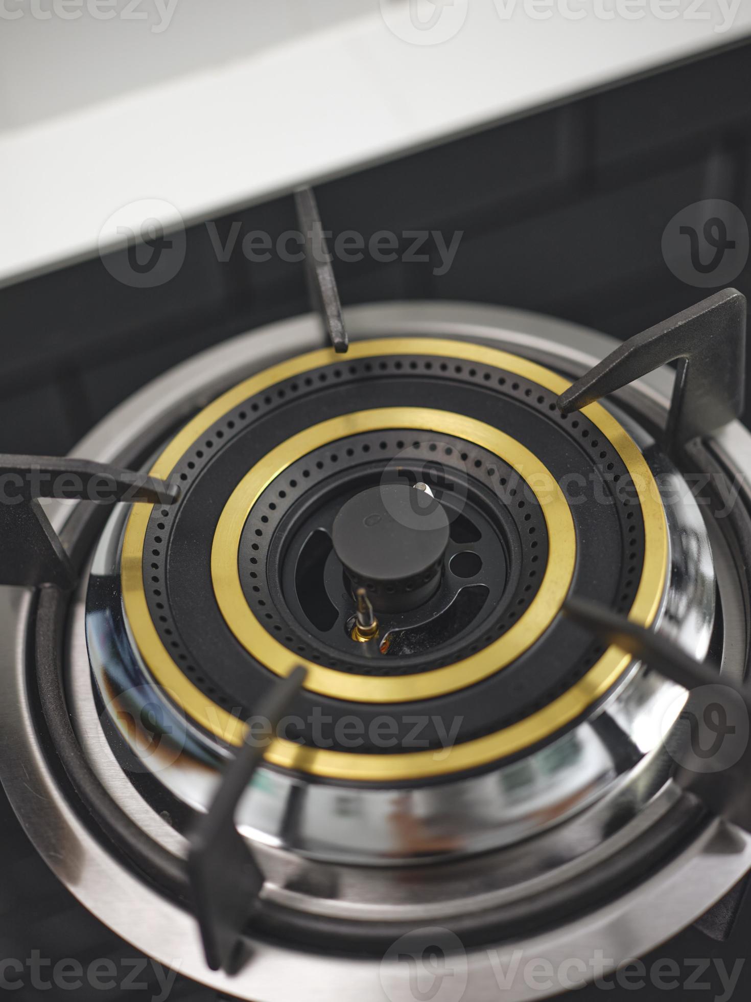 stove with black soot on the gas burner head . 19947333 Stock Photo at