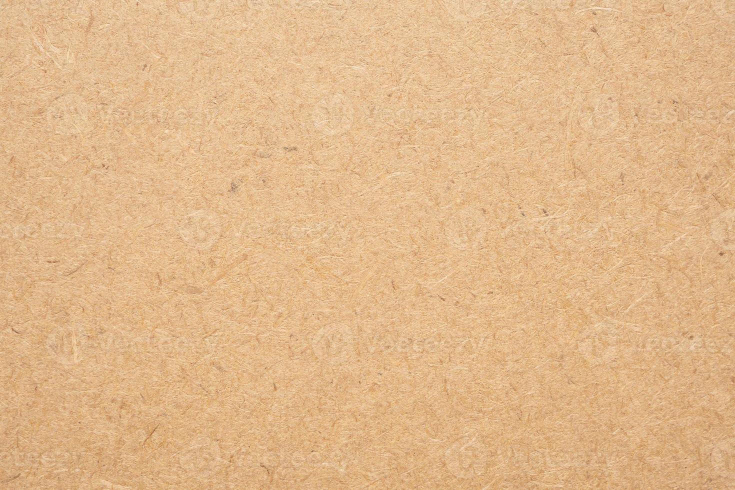 Fondo de textura de papel de cartón de reciclaje marrón antiguo foto