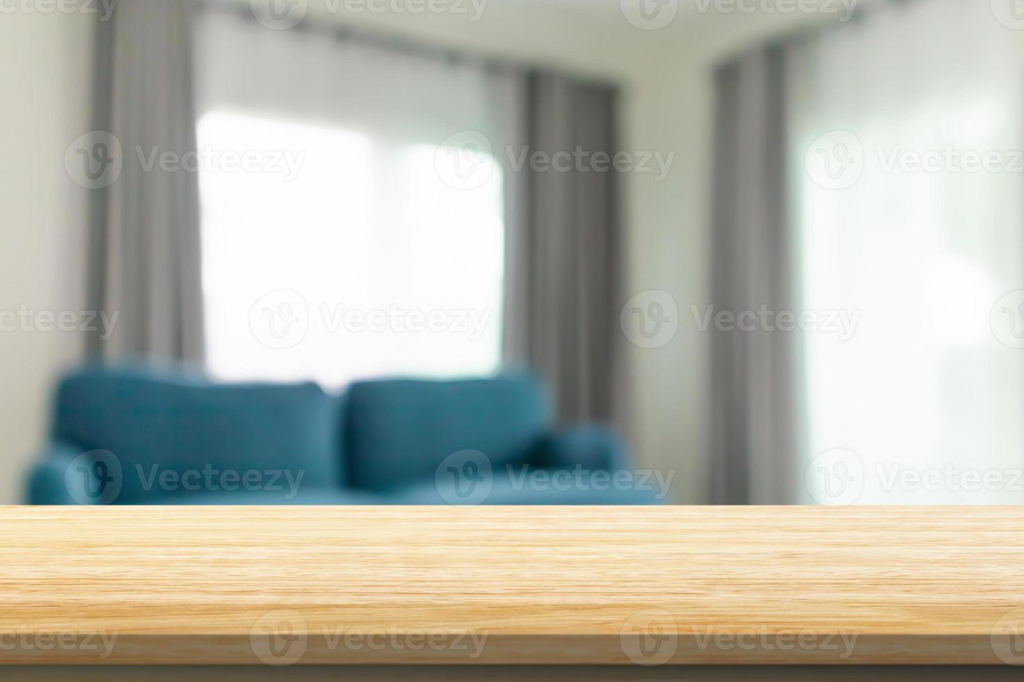 Empty wood table top with blur room interior with window curtain background photo