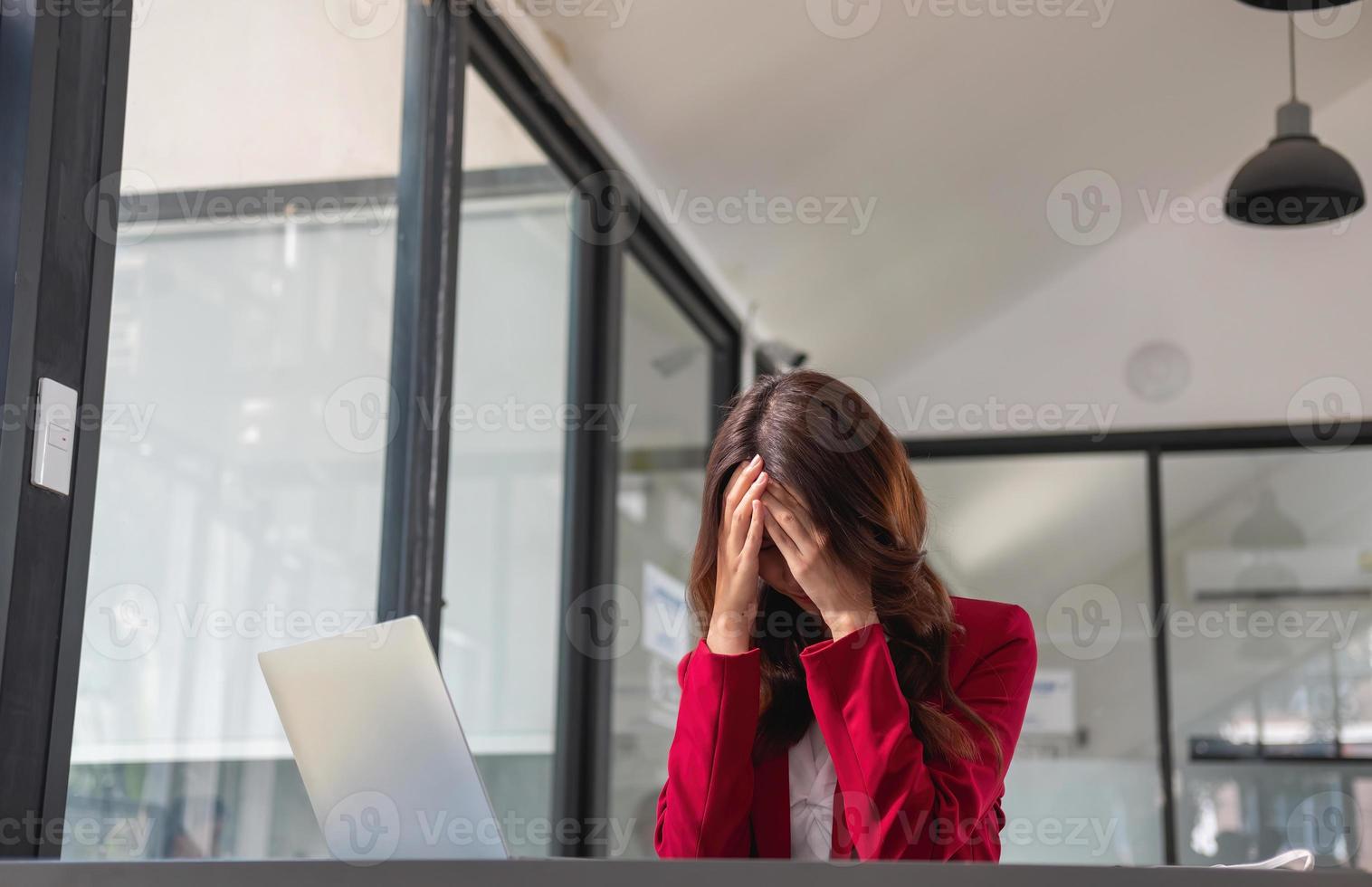 Concept Burnout Syndrome. Business Woman feels uncomfortable working. Which is caused by stress, accumulated from unsuccessful work And less resting body. Consult a specialist psychiatrist. photo