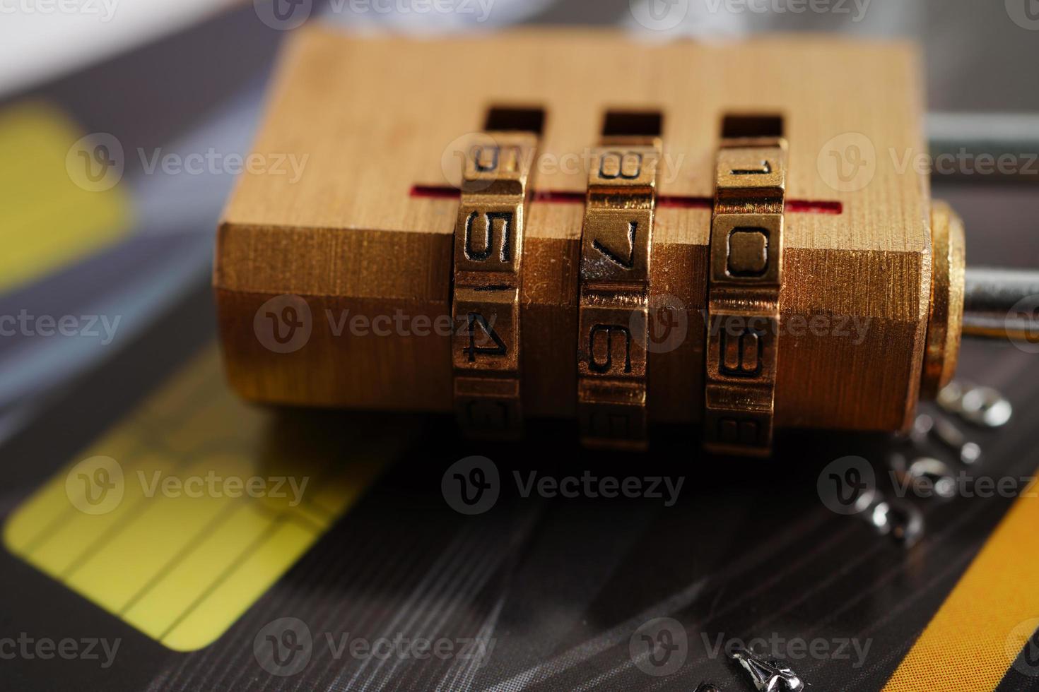 Credit card with password key lock, security finance business concept. photo