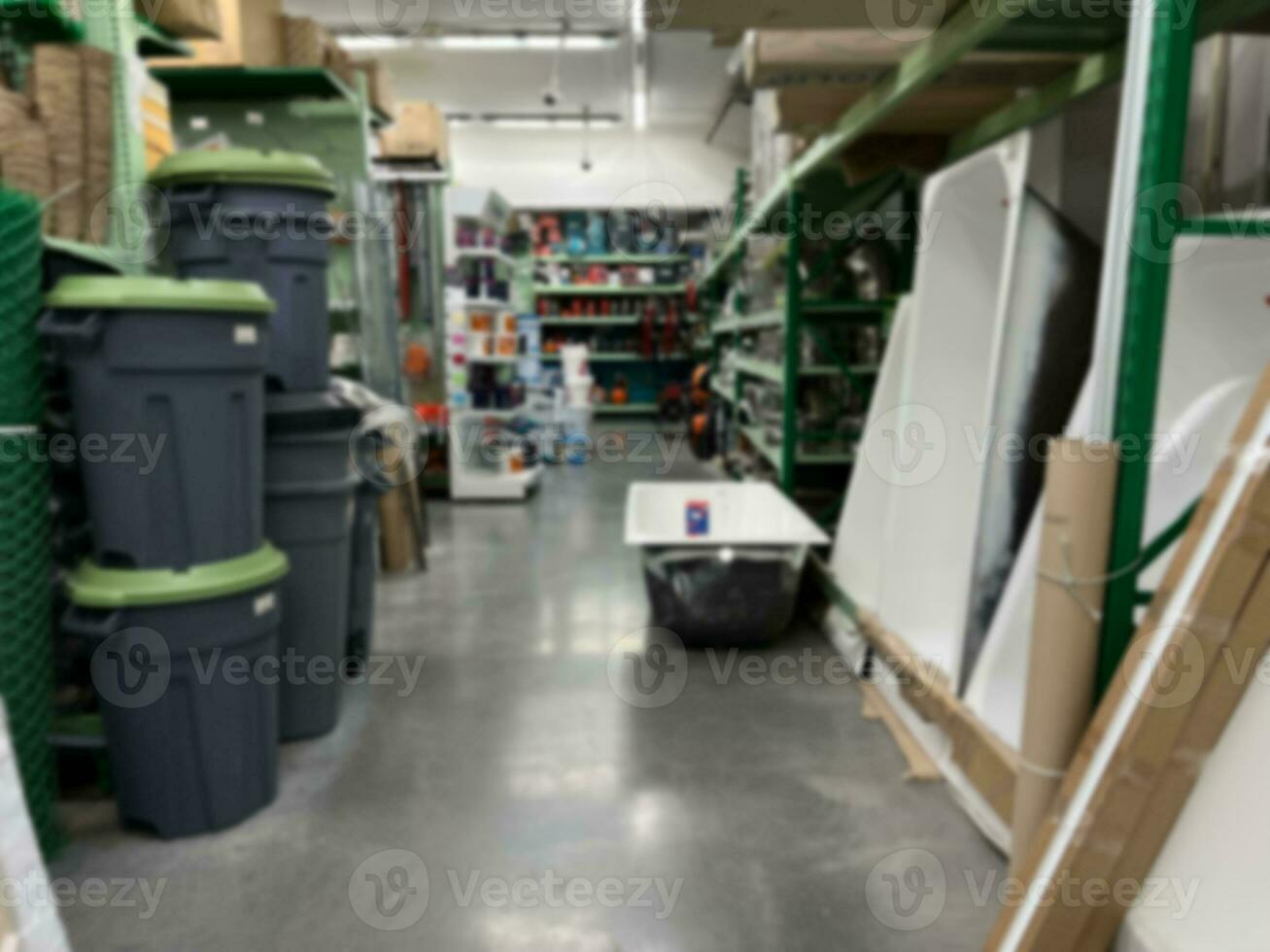 A blurry image of a hardware store with paints, varnish, brushes in a building materials store as a trading background. For the design. photo