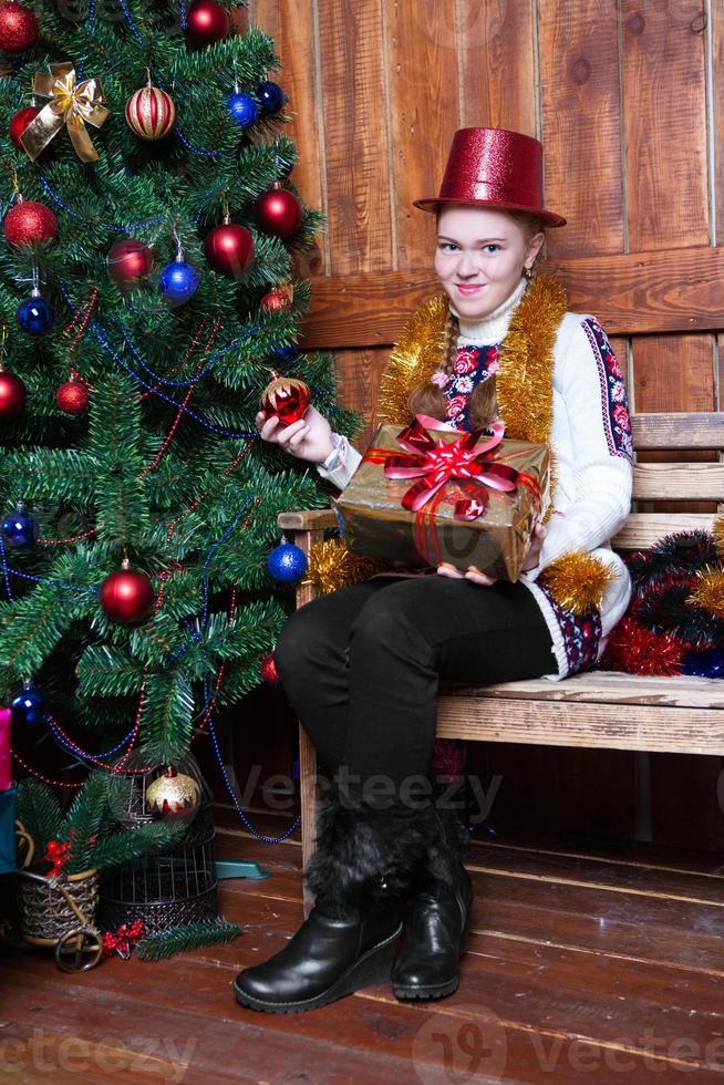 Cute girl with a gift photo