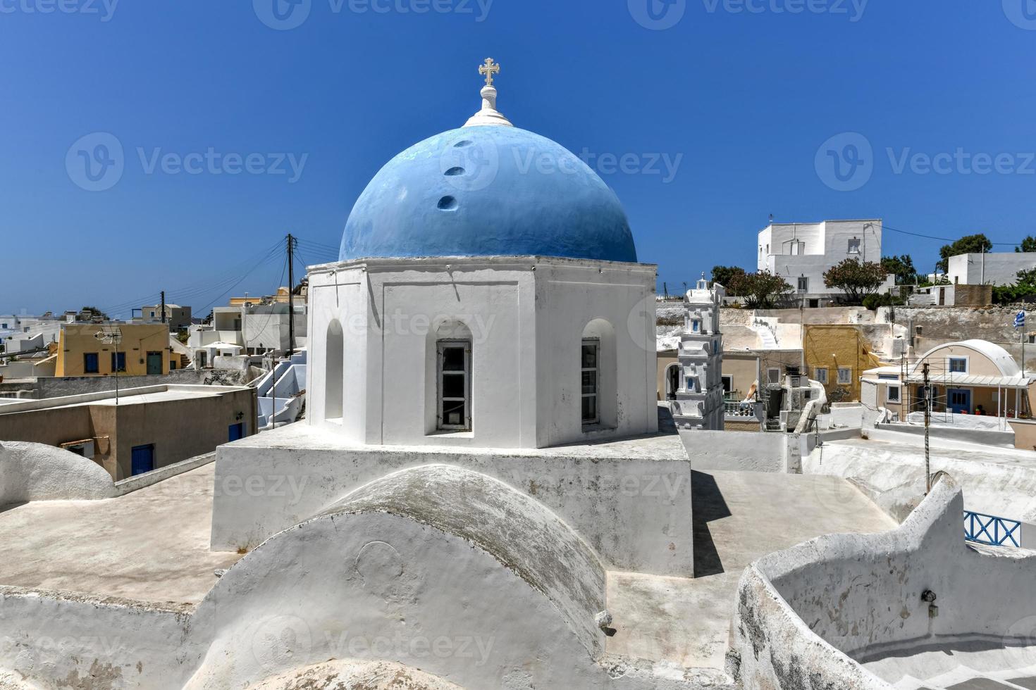 A view of the blue dome of the Panagia ton Eisodion church in the traditional village of Megalochori. photo