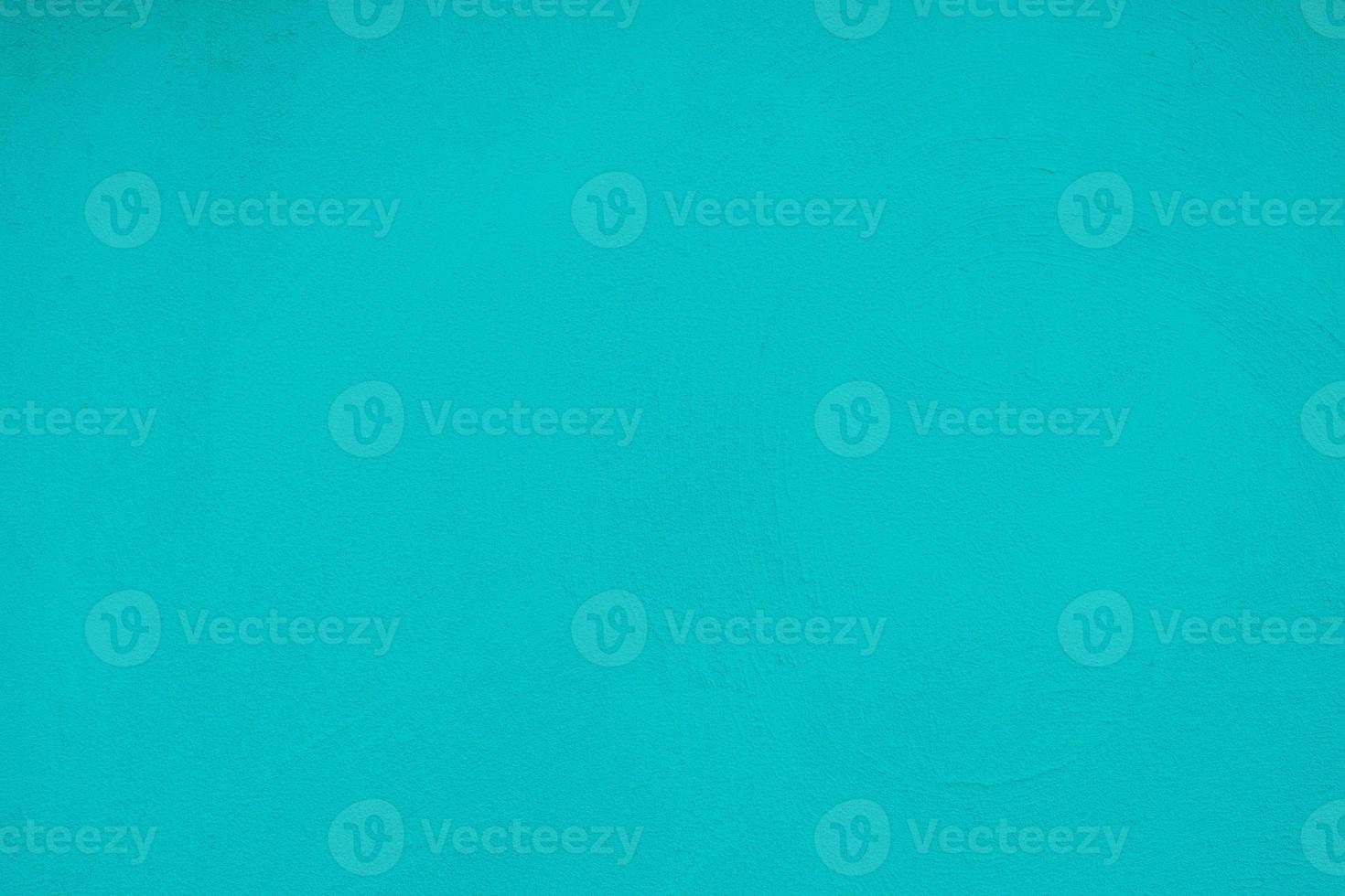 Dark Turquoise Color Concrete Wall with Wave Plaster Texture Background. photo