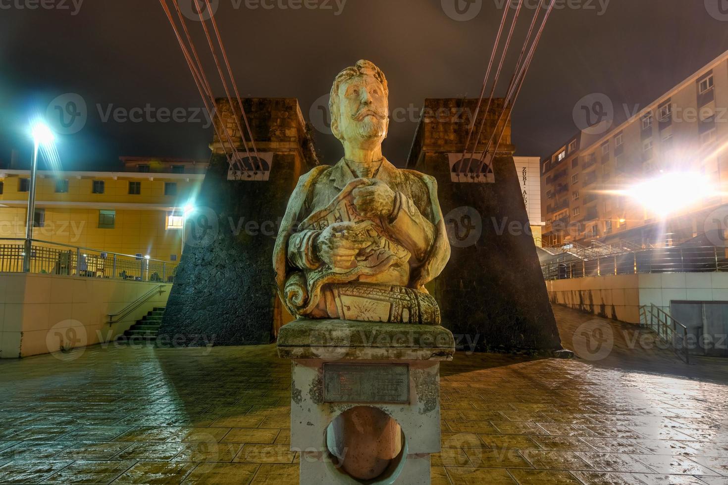 Bust of Alberto de Palacio, architect of the suspension bridge in front of his creation Las Arenas Areeta Getxo Basque Country Spain photo