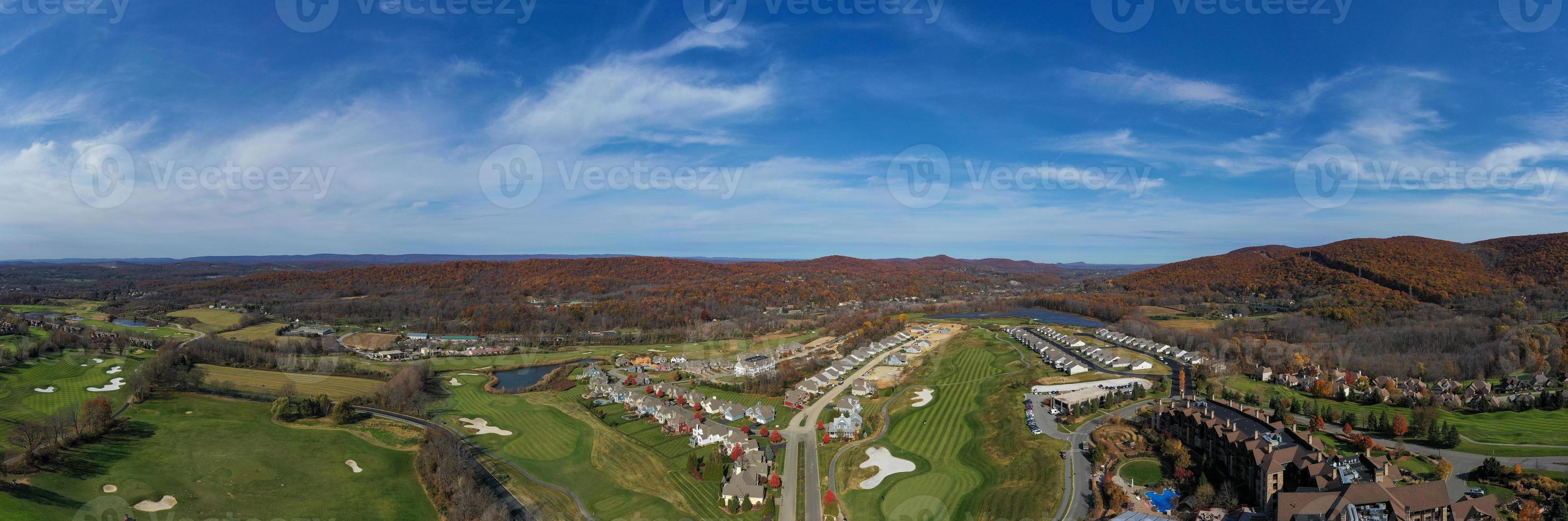 Aerial view of houses in Hamburg, New Jersey during peak foilage in autumn time. photo