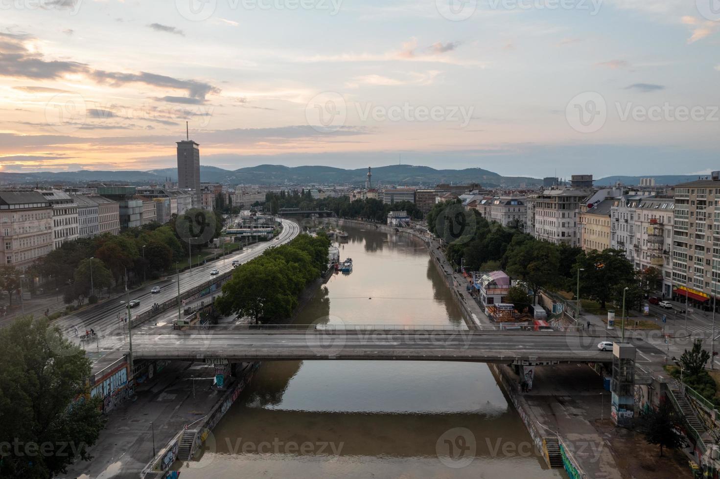 Vienna, Austria - Jul 18, 2021, View of the Danube Canal and Vienna Skyline in Vienna, Austria photo