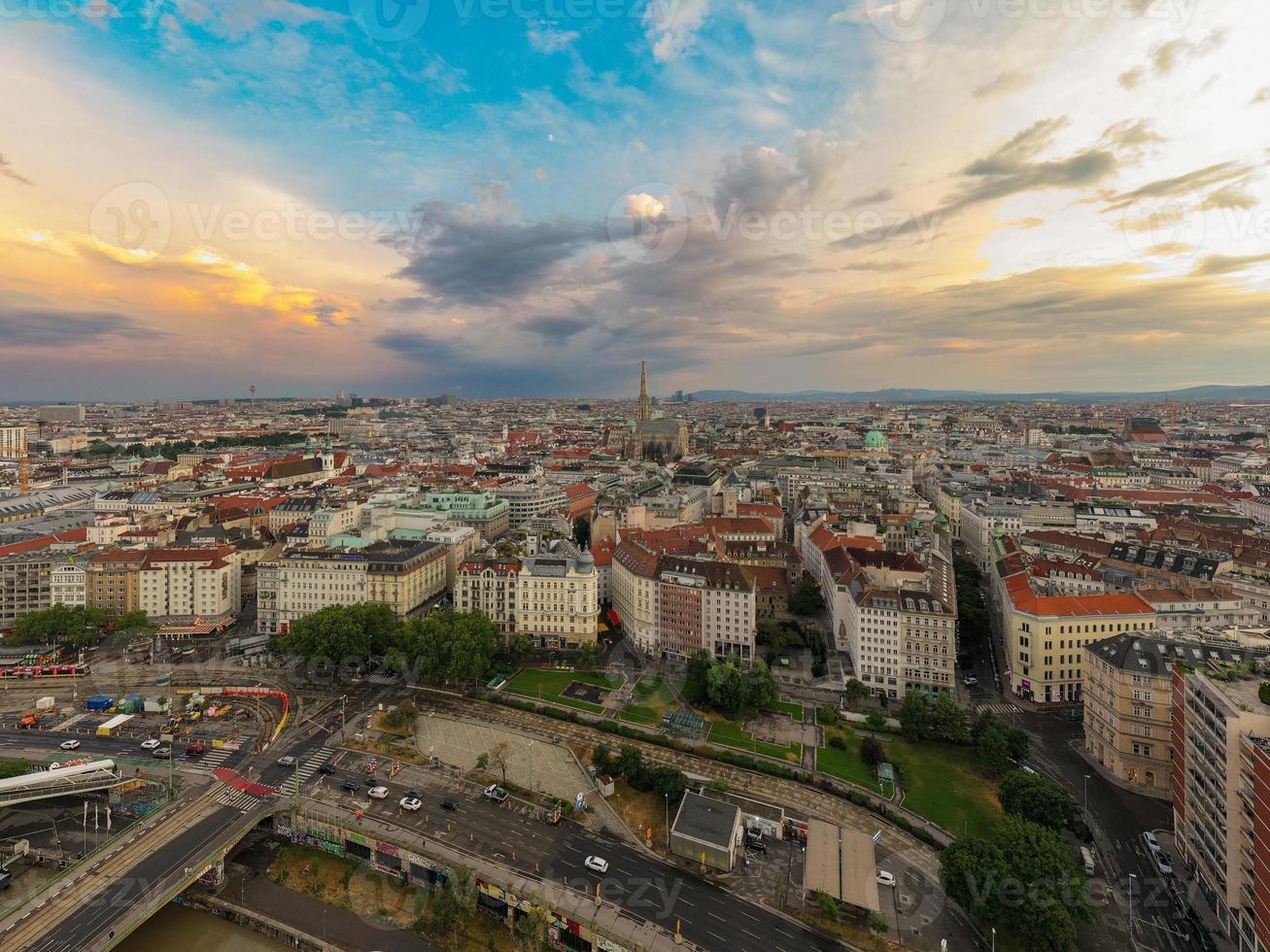 Vienna, Austria - Jul 18, 2021, View of the Danube Canal and Vienna Skyline with St. Stephen's Cathedral Vienna, Austria photo