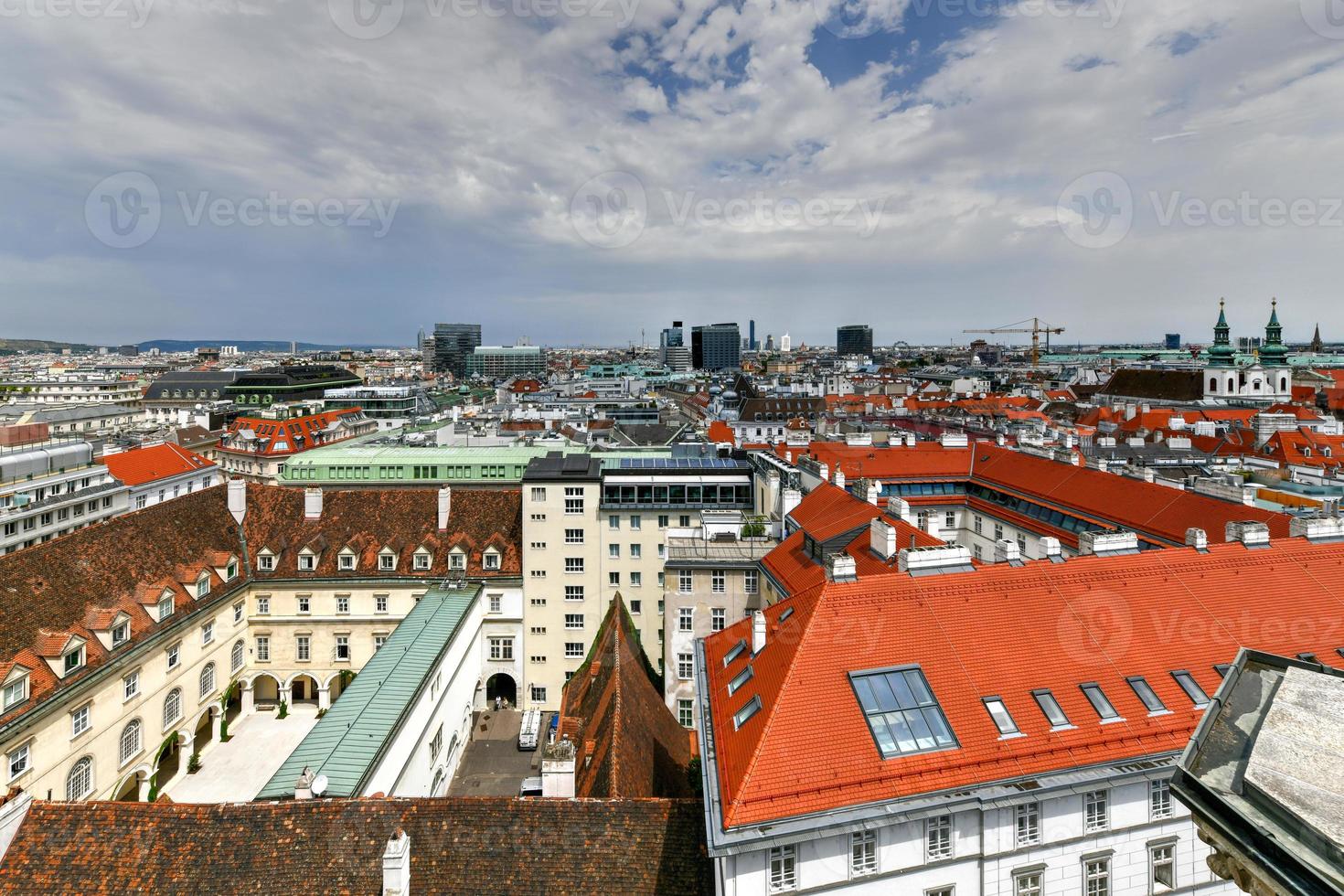 Cityscape from St Stephen Cathedral, or Saint Stephansdom Church in Old city center of Vienna in Austria. Wien in Europe. Panorama, cityscape. Travel and tourism view. Building architecture landmark. photo