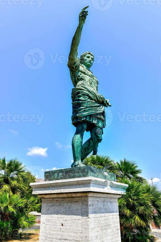 Statue of Caesar Augustus by the Gulf of Naples in Naples, Italy. photo