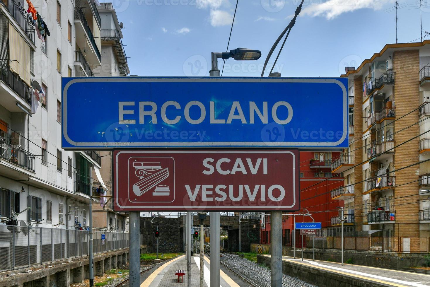 Ercolano railway station on the outskirts of Naples by the ruins of Herculaneum. Inscription Herculaneum - Vesuvius Excavations. photo