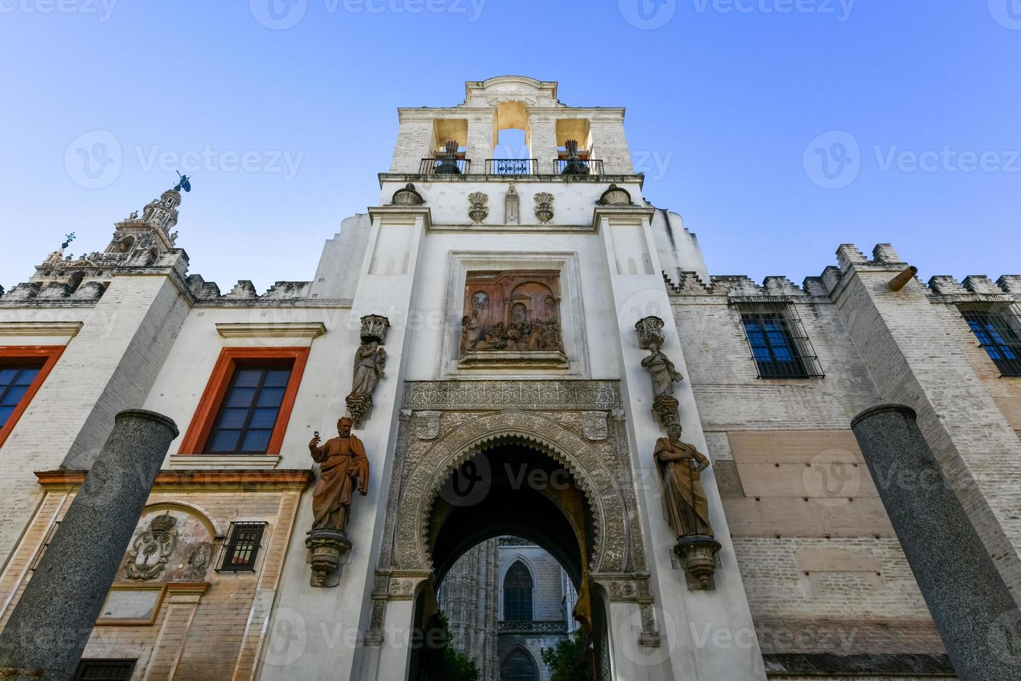 Wide angle view of Portal el Perdon or the Door of Forgiveness of the Seville Cathedral photo