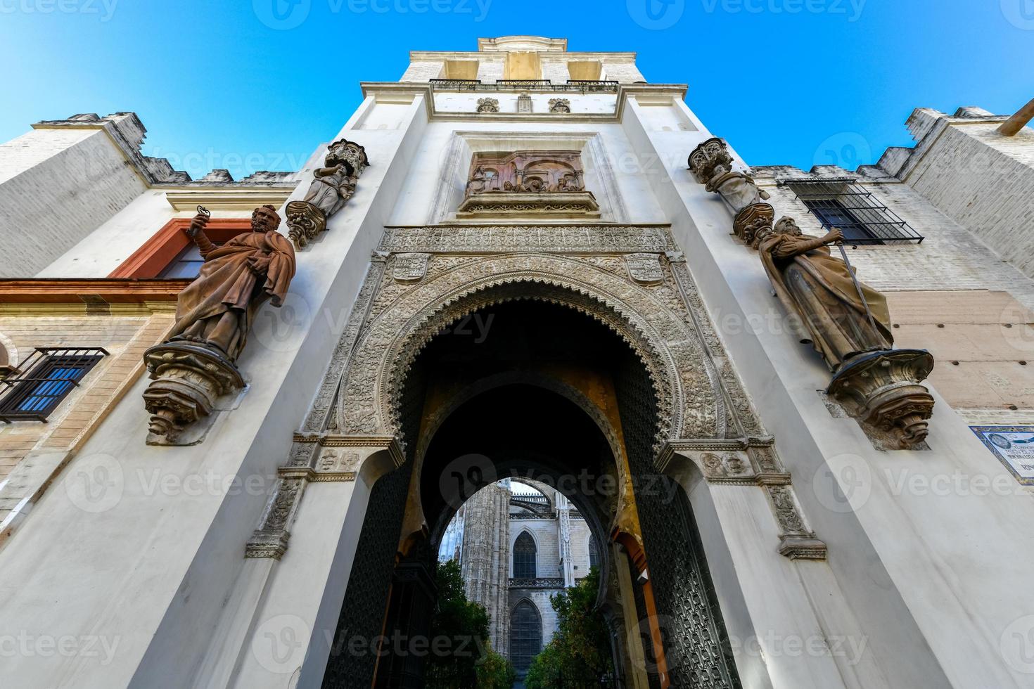 Wide angle view of Portal el Perdon or the Door of Forgiveness of the Seville Cathedral photo