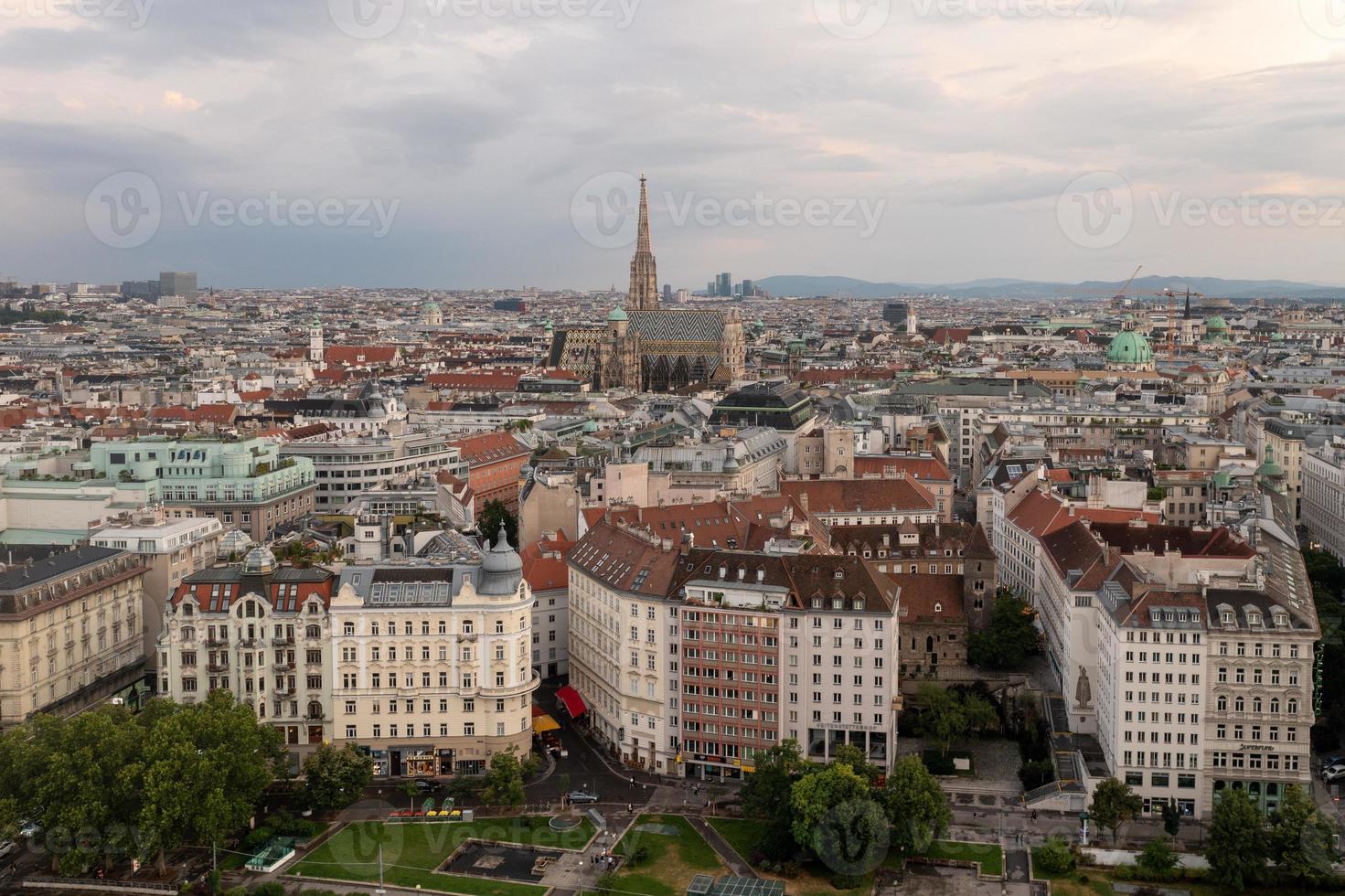 Vienna, Austria - Jul 18, 2021, View of the Danube Canal and Vienna Skyline with St. Stephen's Cathedral Vienna, Austria photo