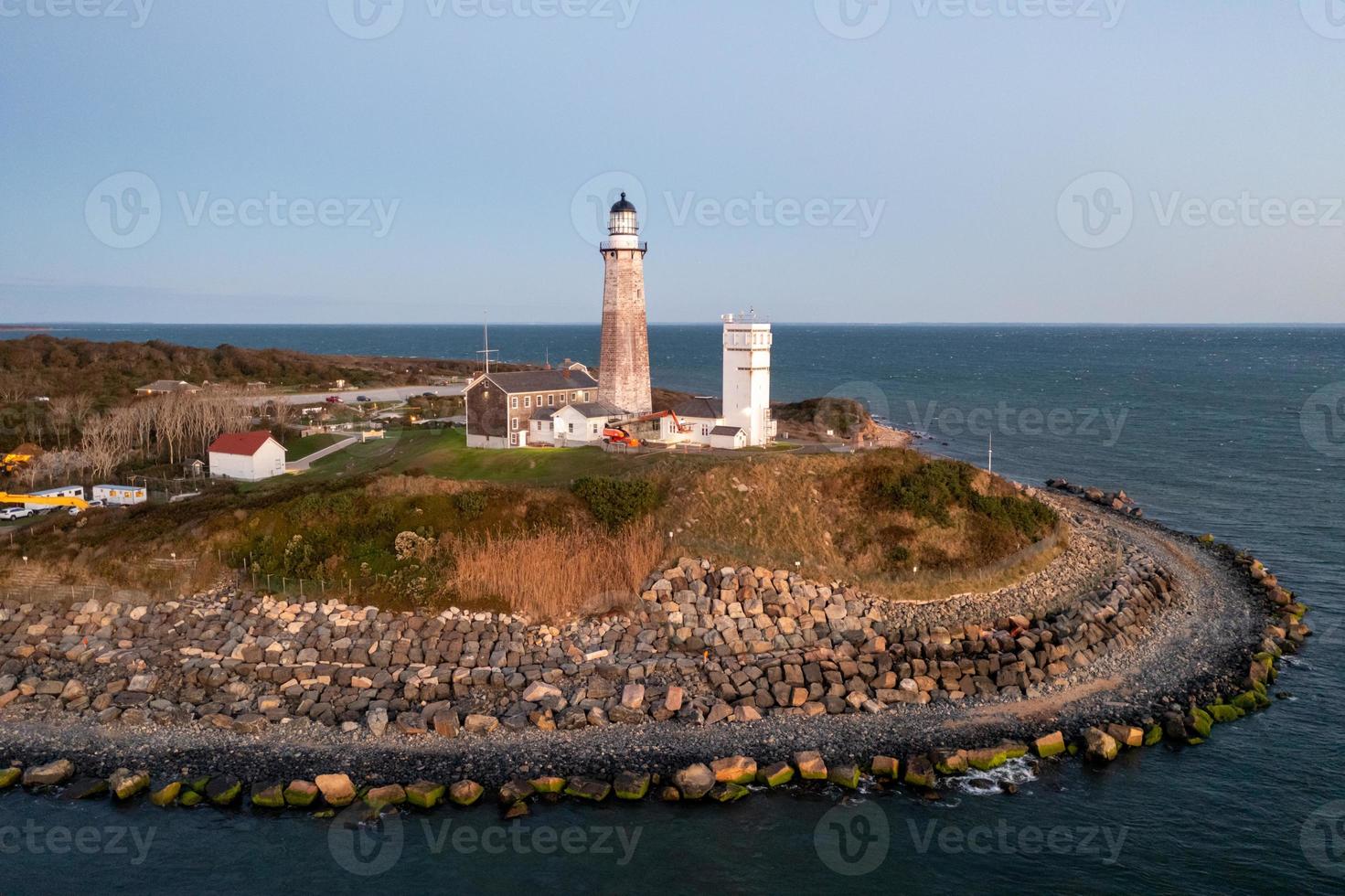 Montauk Lighthouse and beach at sunrise, Long Island, New York, USA. photo