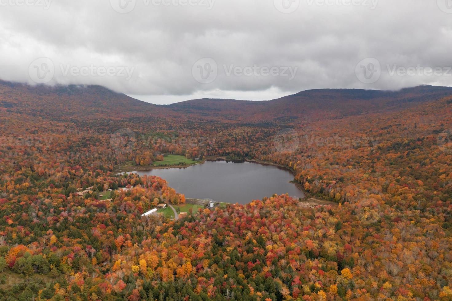 Colgate Lake in Upstate New York during peak fall foliage season. photo