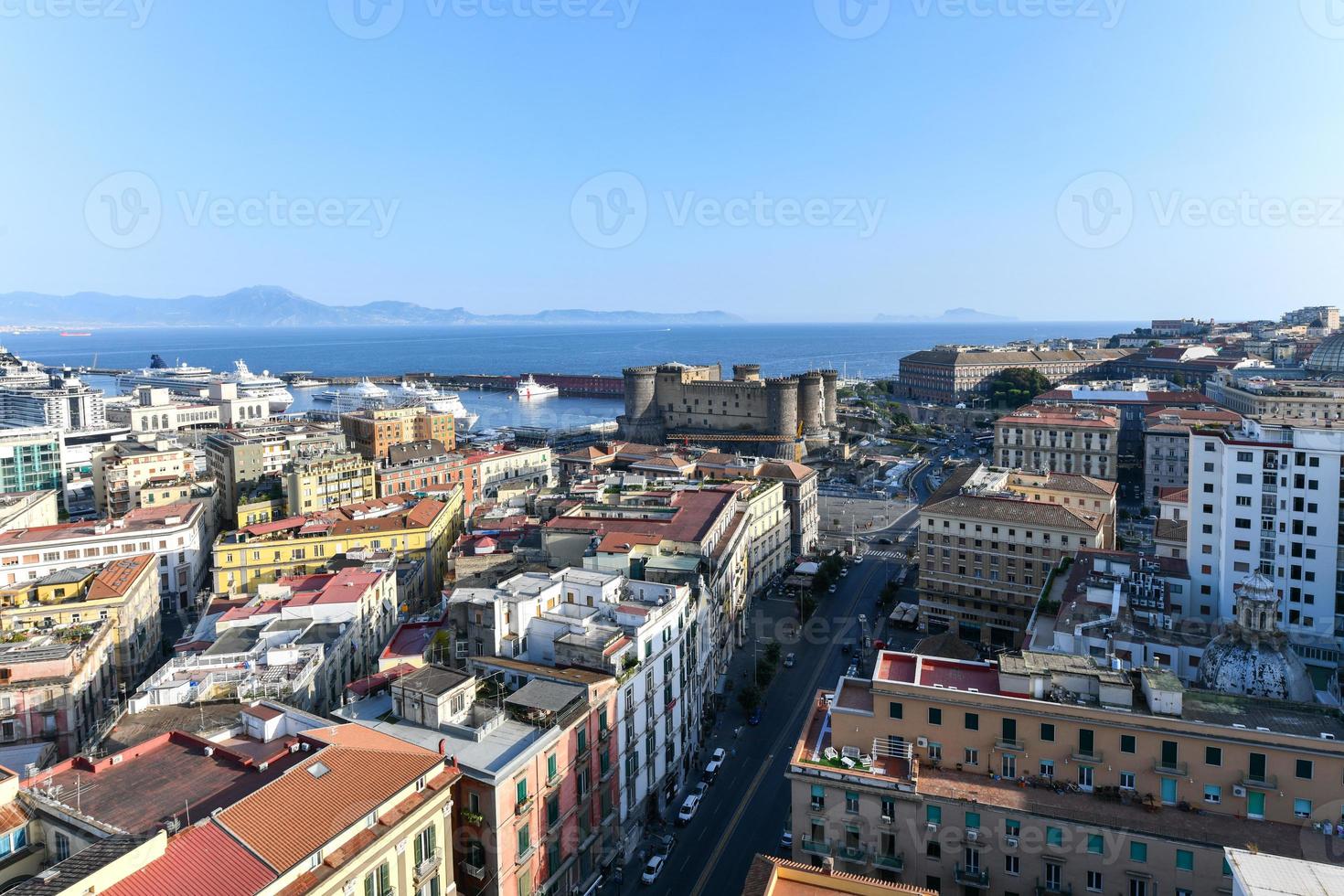 Aerial view of Naples, Italy, and his harbor on Mediterranean Sea. photo