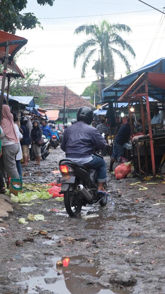 traditional market atmosphere after heavy rain photo