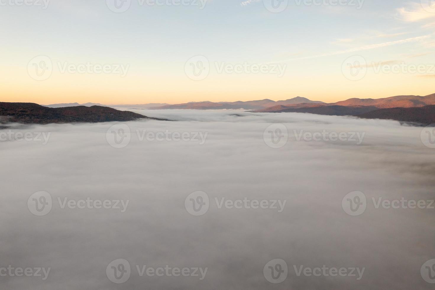 Panoramic view of peak fall foliage in Stowe, Vermont. photo