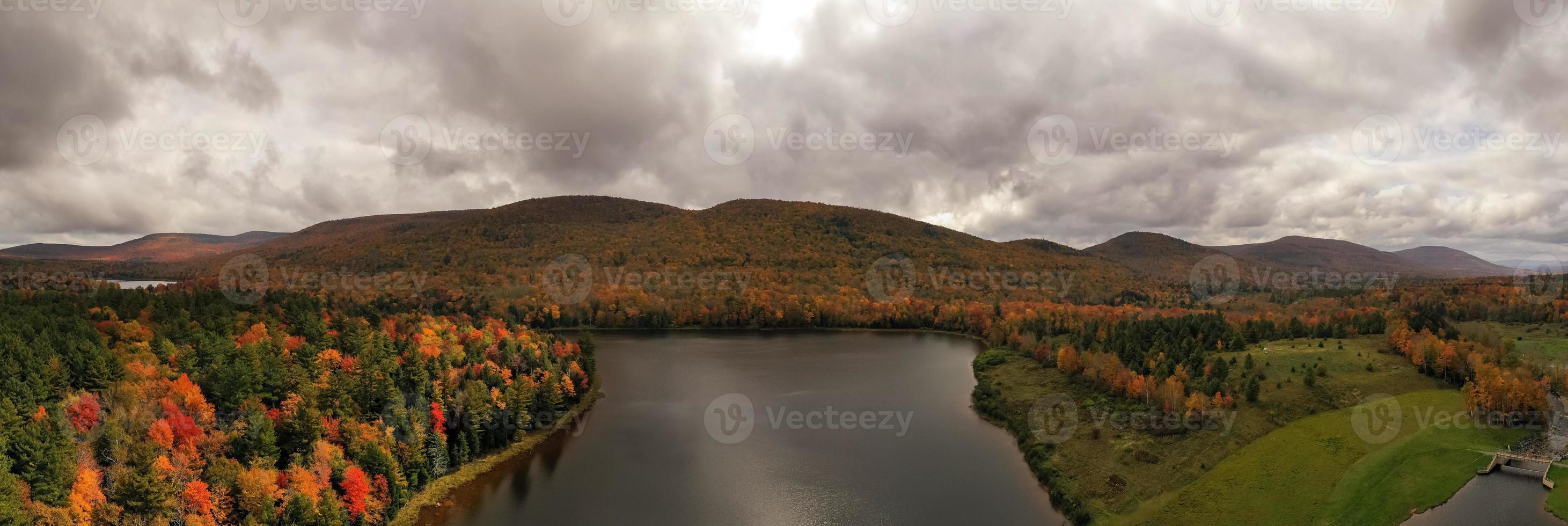 Colgate Lake in Upstate New York during peak fall foliage season. photo