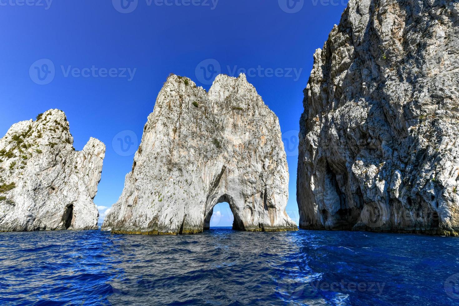 Capri Island on a beautiful summer day along the Amalfi Coast in Italy photo