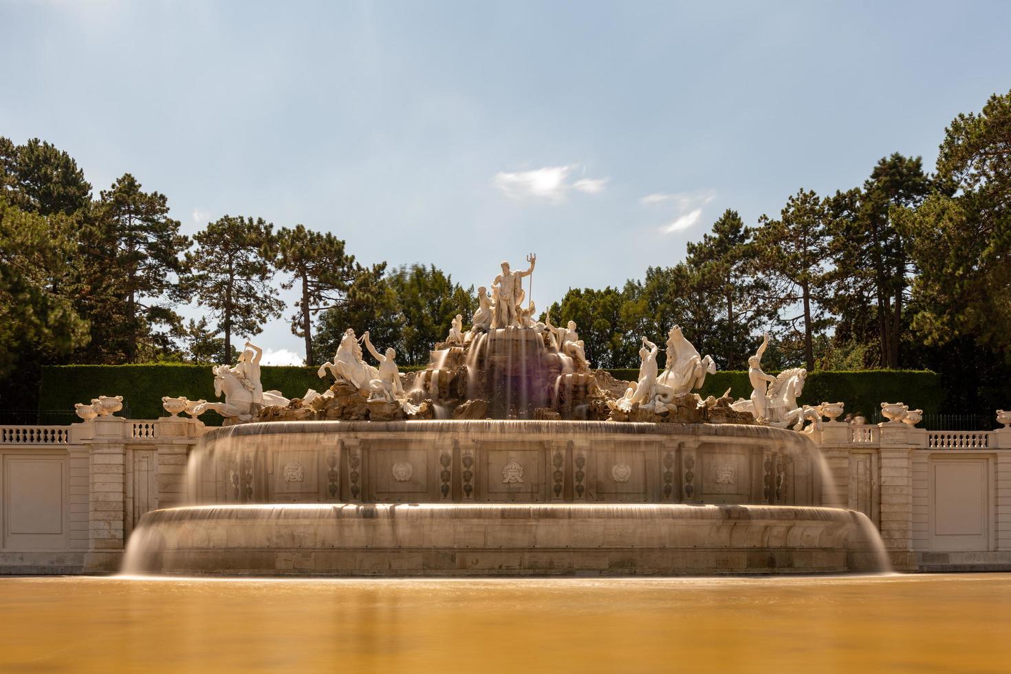Vienna, Austria - Jul 16, 2021, View of the Neptune fountain in Schonbrunn Palace, Vienna, Austria photo