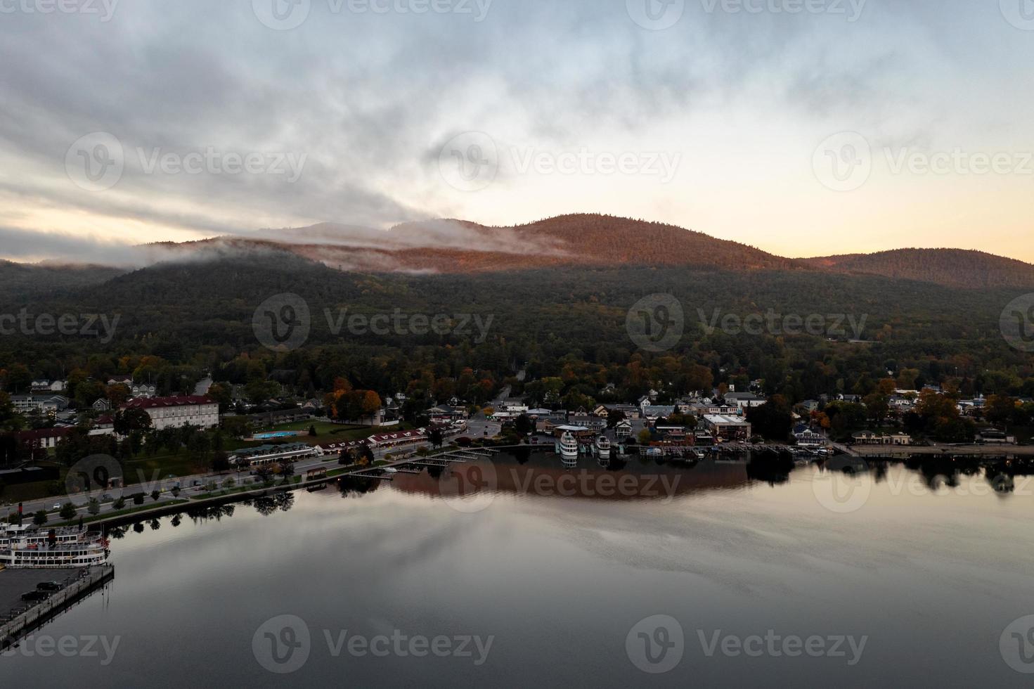 Lake George, New York - October 10, 2021, Tourist boats in the bay in Lake George, New York at dawn. photo