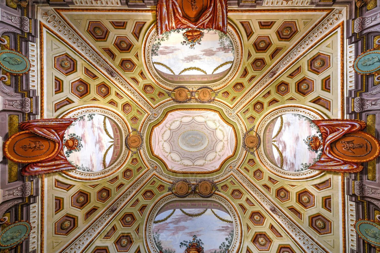 Caserta, Italy - Aug 21, 2021, A internal view of the Royal Palace of Caserta, a historic palace commissioned in the 18th century by Charles of Bourbon, king of Naples. photo