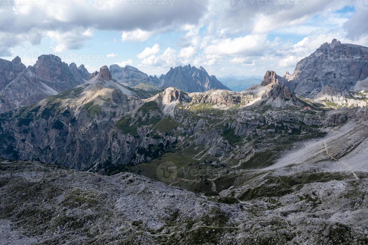 Beautiful sunny day in Dolomites mountains. View on Tre Cime di Lavaredo - three famous mountain peaks that resemble chimneys. photo