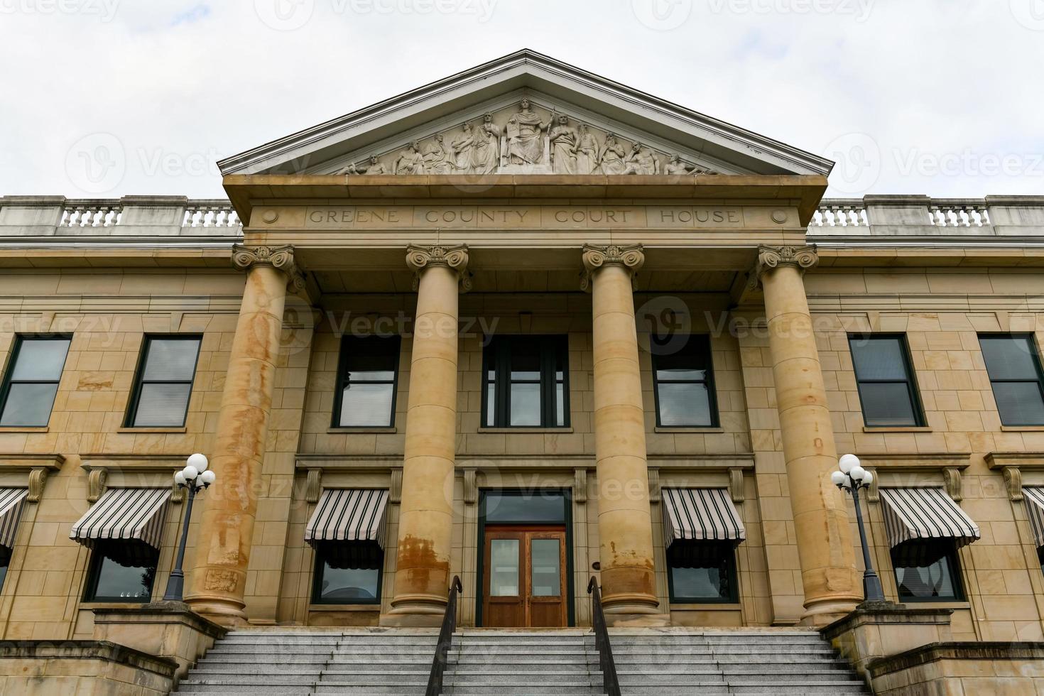 The Greene County Court House in Catskill, NY on a cloudy day. photo