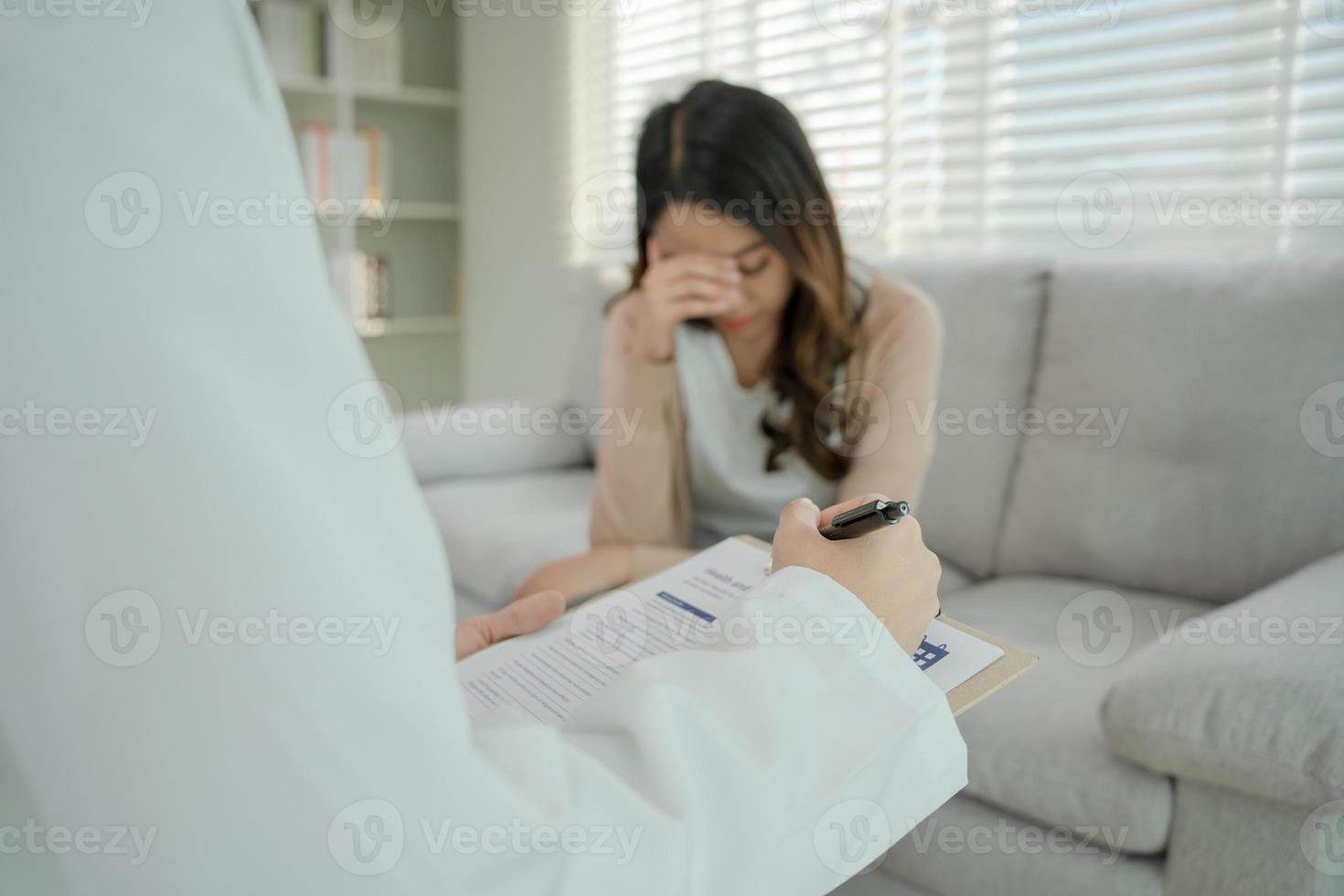 woman with mental health problems is consulting. psychiatrist is recording the patient's condition for treatment. encouragement, love and family problem, bipolar , depression patient, protect suicide photo