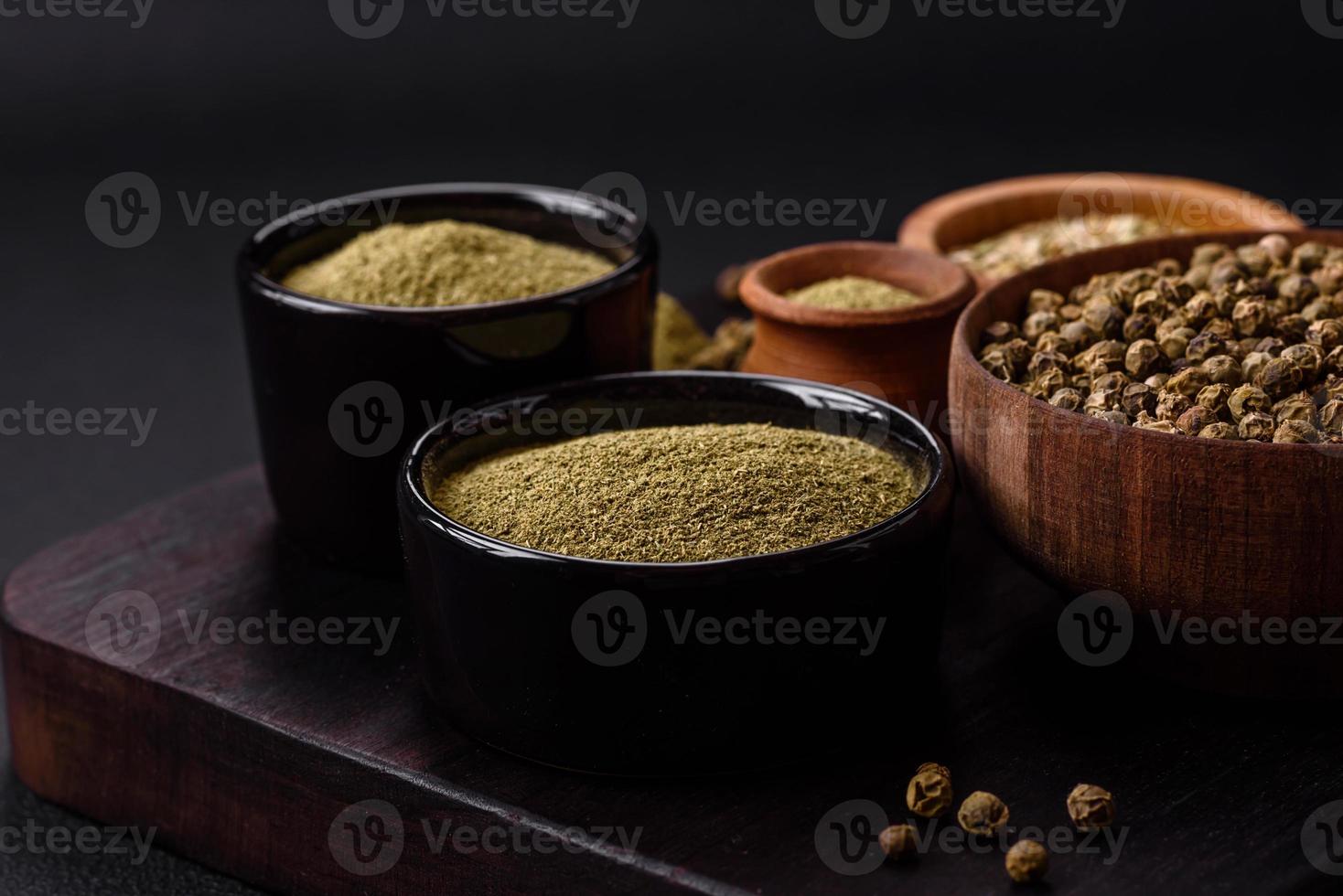 Spice dried dill or basil in the form of green powder photo