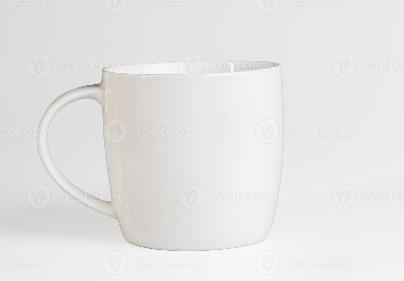 White cup on a white background. Side view. Mockup template photo