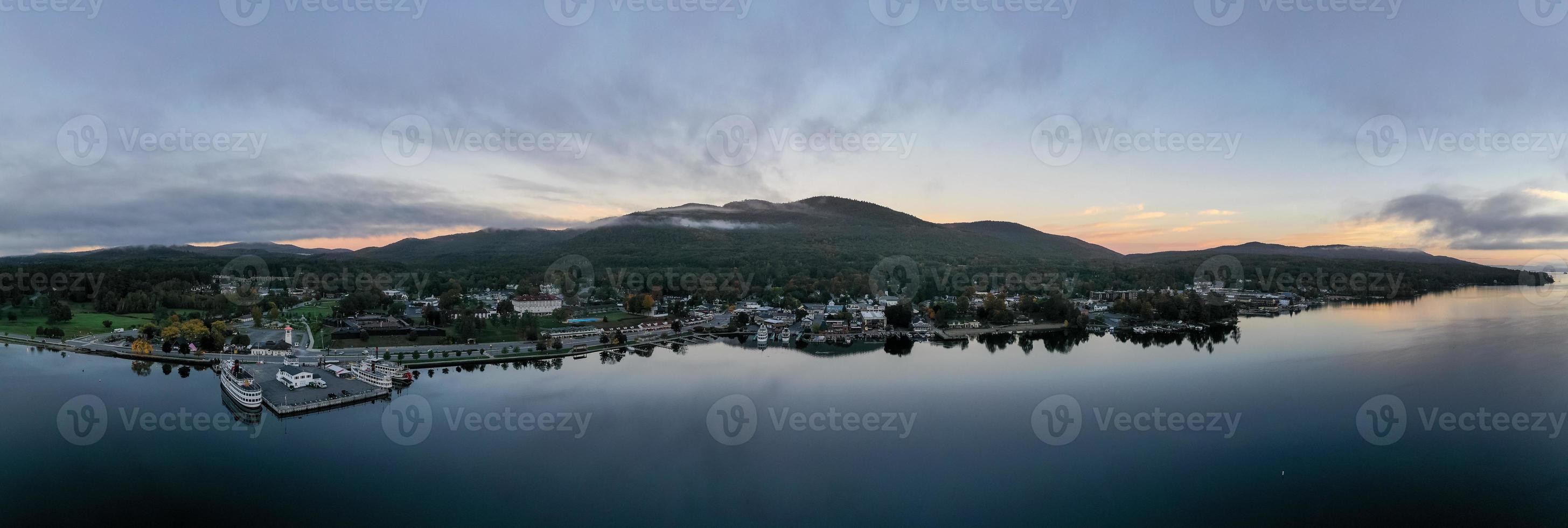 Lake George, New York - October 10, 2021, Tourist boats in the bay in Lake George, New York at dawn. photo