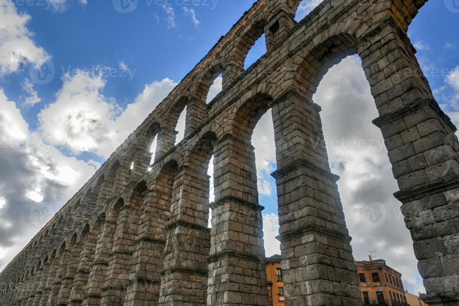 Ancient Roman aqueduct on Plaza del Azoguejo square in Segovia, Spain. photo