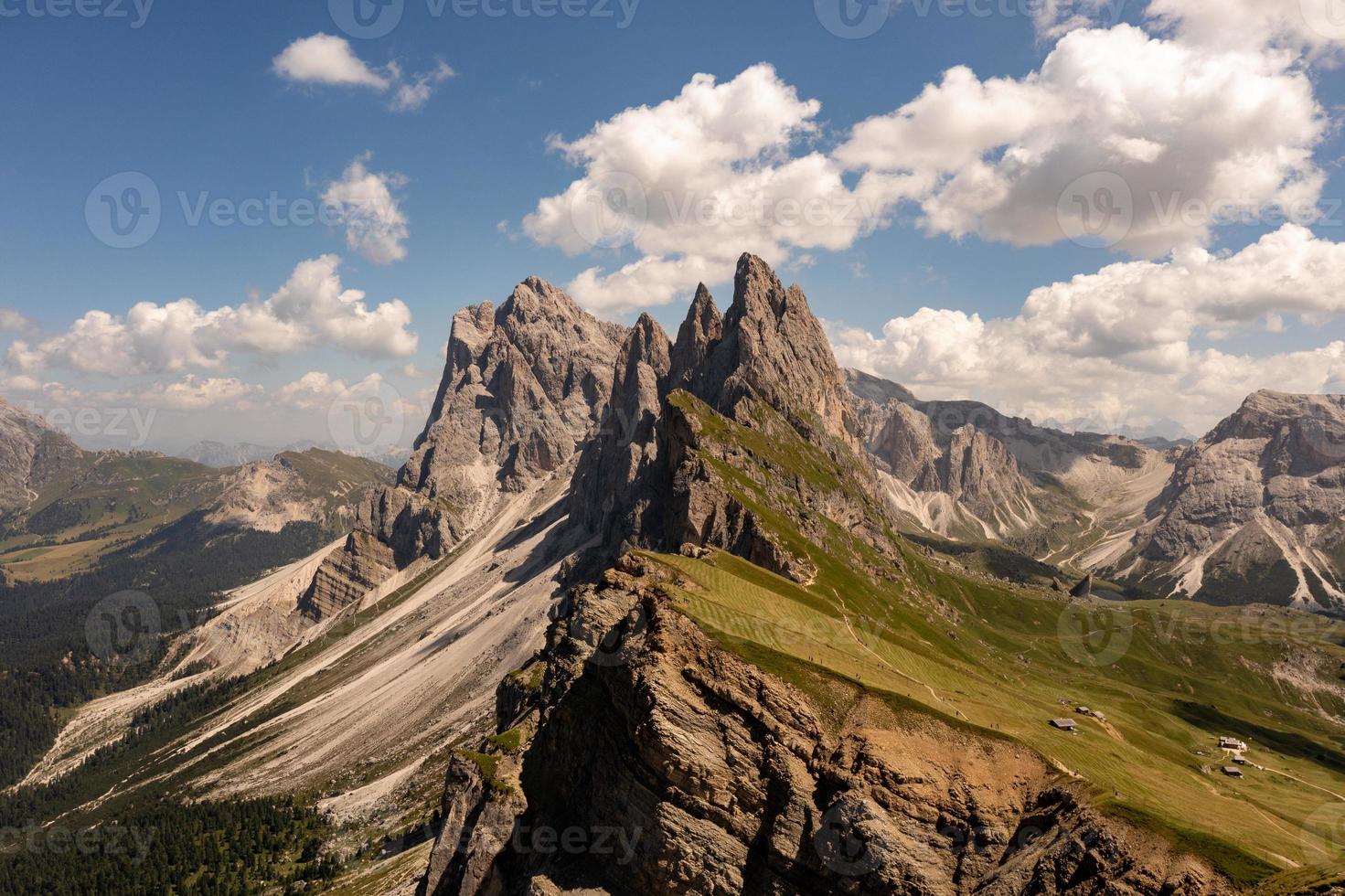 Morning view of the Gardena valley in Dolomite mountains. Location Puez-Geisler National Park, Seceda peak, Italy, Europe. Odle group is the landmark of Val di Funes. photo
