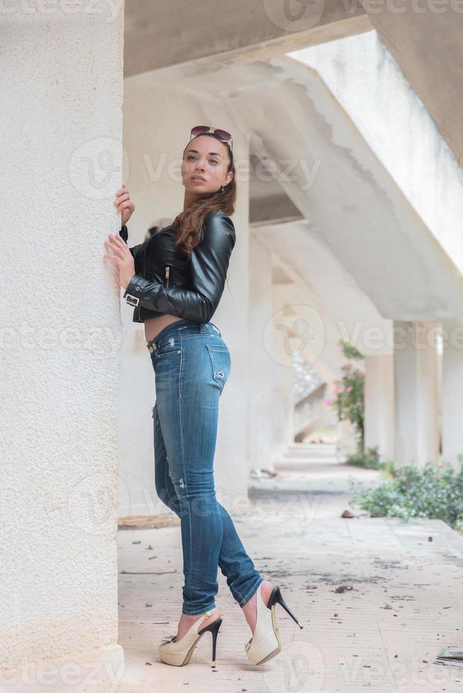 Young cute woman posing standing photo