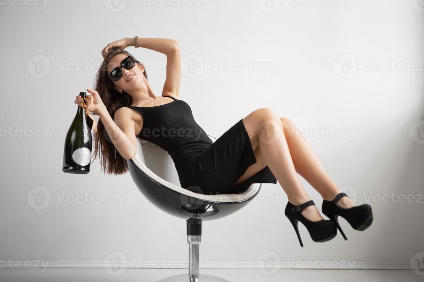Smiling brunette in glasses photo