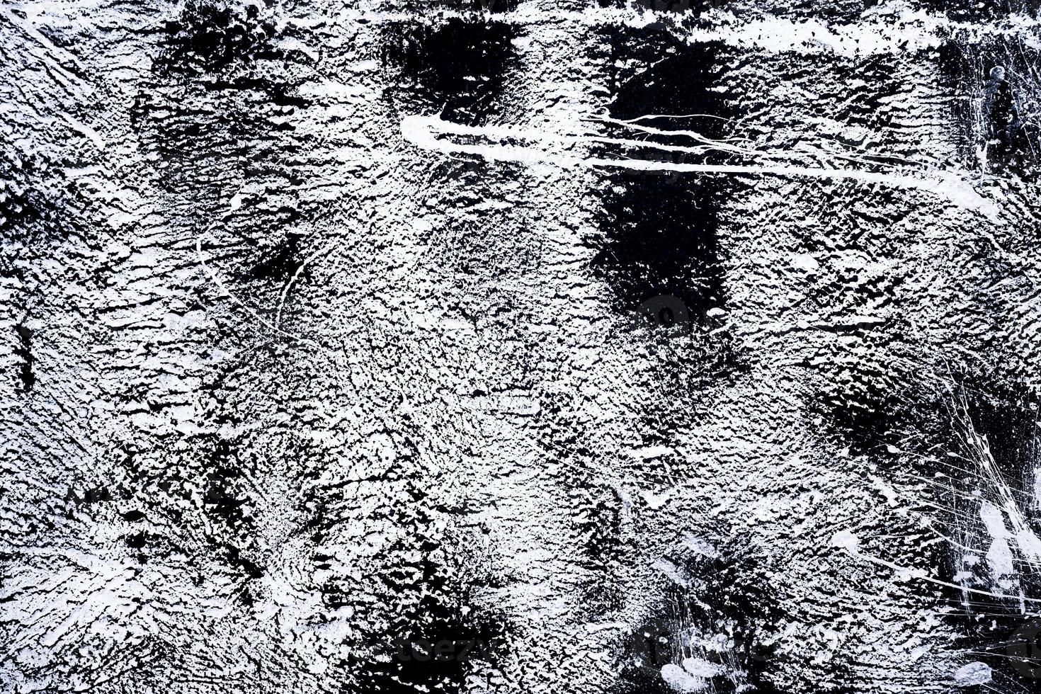 Black and white tones grunge. Background abstract black and white. Texture dark from includes a effect cracks and chips. Monochrome grunge texture photo