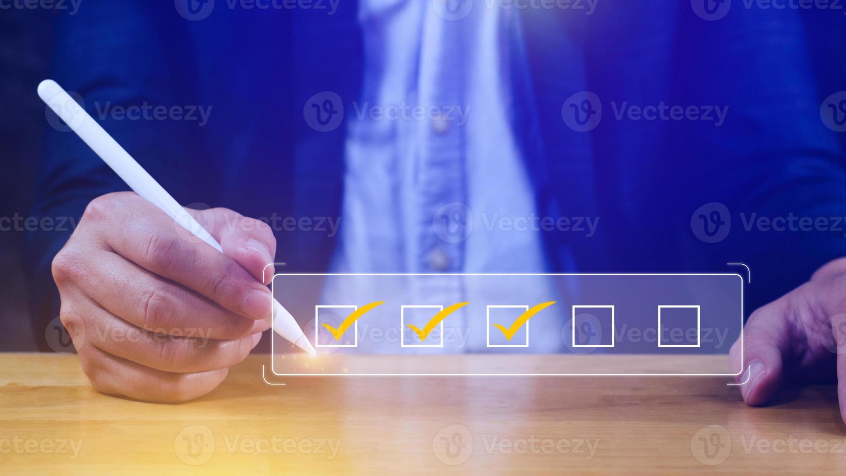 Businessman tick correct sign mark for document approve , project acceptance and quality assurance concept, take an assessment, questionnaire, evaluation, online survey online exam check list photo