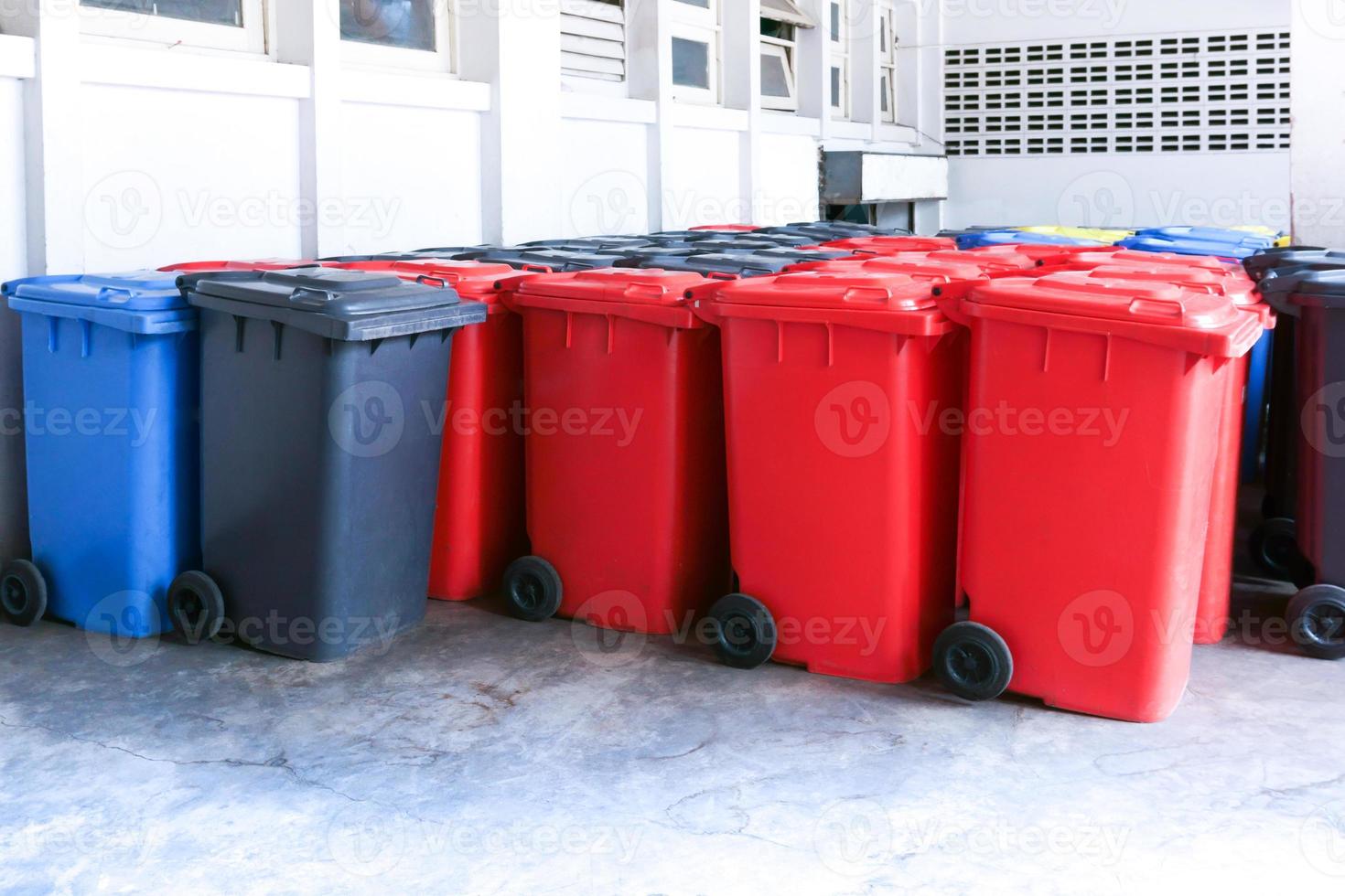 Group of new large colorful wheelie bins for rubbish, recycling waste,Large trash cans garbage bins photo