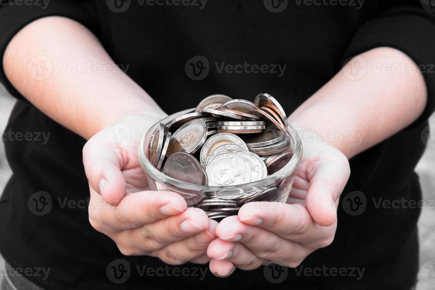 Coins in hands saving,Donation Investment Fund Financial Support Charity  Dividend Market  House Stock Trust Wealthy Giving Planned Accounting Collection Debt Banking ROI photo